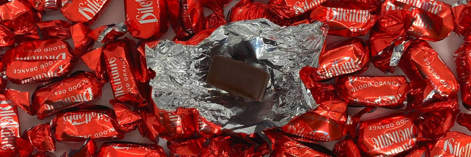 Dilettante Chocolates Opened Blood Orange TruffleCreme Banner