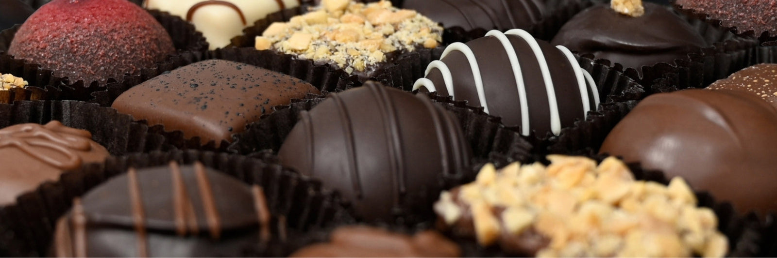 Dilettante Chocolates Hand Dipped Truffle Assortments featuring Ephemere truffles, Rheingold Toffee, and L'Orange truffles