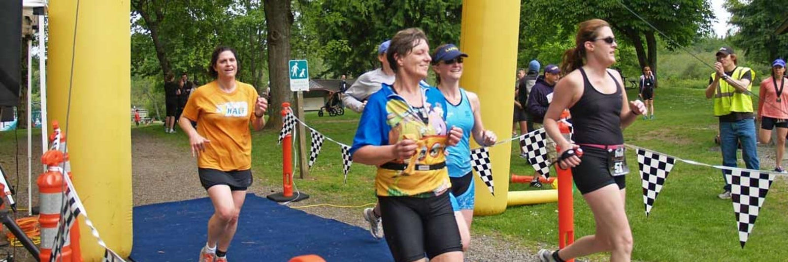 Women Finishing the Dilettante Women's Triathlon 2013