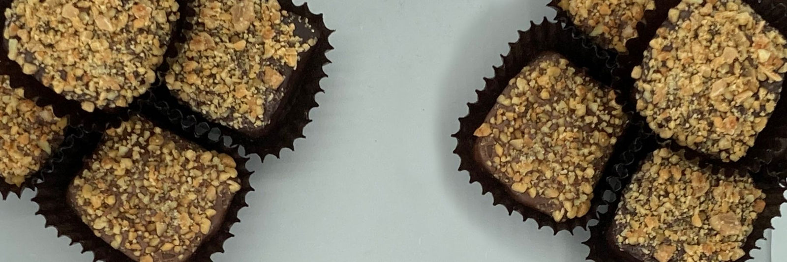 Dilettante Chocolates Rheingold Toffee Stacked in Small Piles