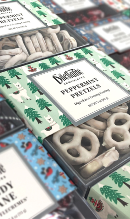 Dilettante Chocolates White Chocolate Covered Peppermint Pretzels against a white background