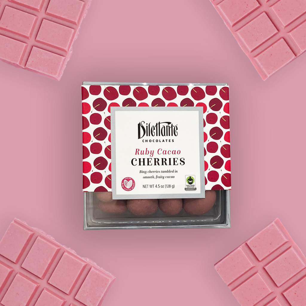 Dilettante Chocolates Chocolate-Covered Ruby Cacao Gift Box Featuring flavorful Bing cherries covered in lush layers of pink Ruby Cacao chocolate.